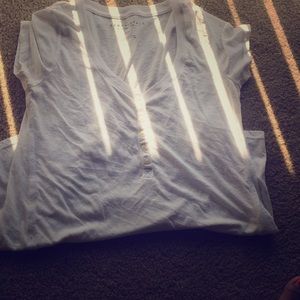 white button up shirt .